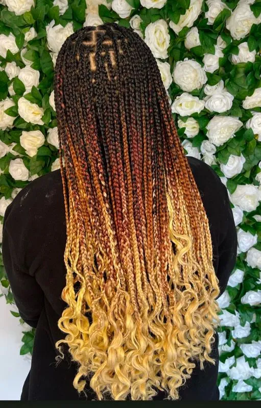 Medium knotless braids — real salon work by Mariama