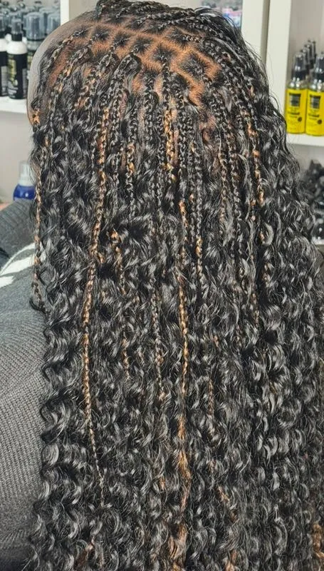 Smedium Boho Knotless/box Braids ( Synthetic Curls) — real salon work by Mariama